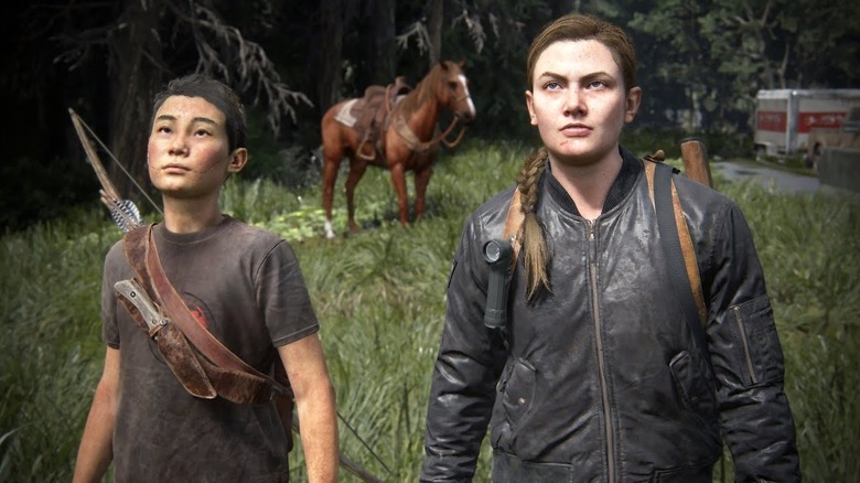 Abby e Lev em cena do jogo The Last of Us Part II