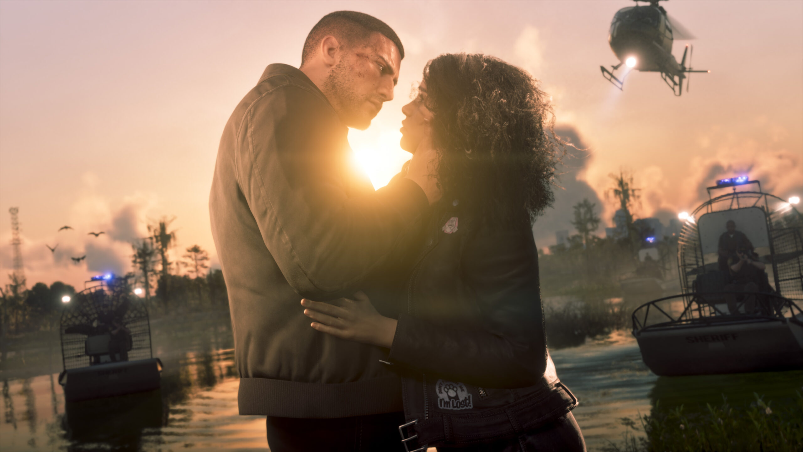 Jason e Lucia abraçados ao pôr do sol em imagem oficial de GTA 6