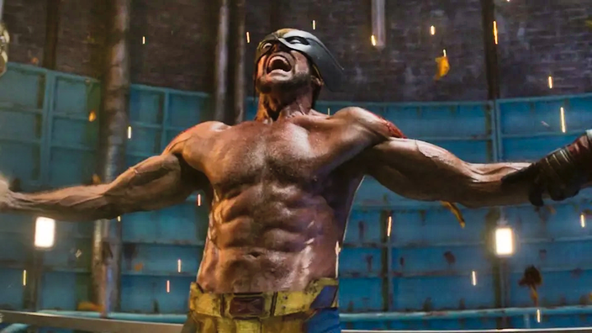 Hugh Jackman como Wolverine, com máscara e garras, em Deadpool & Wolverine