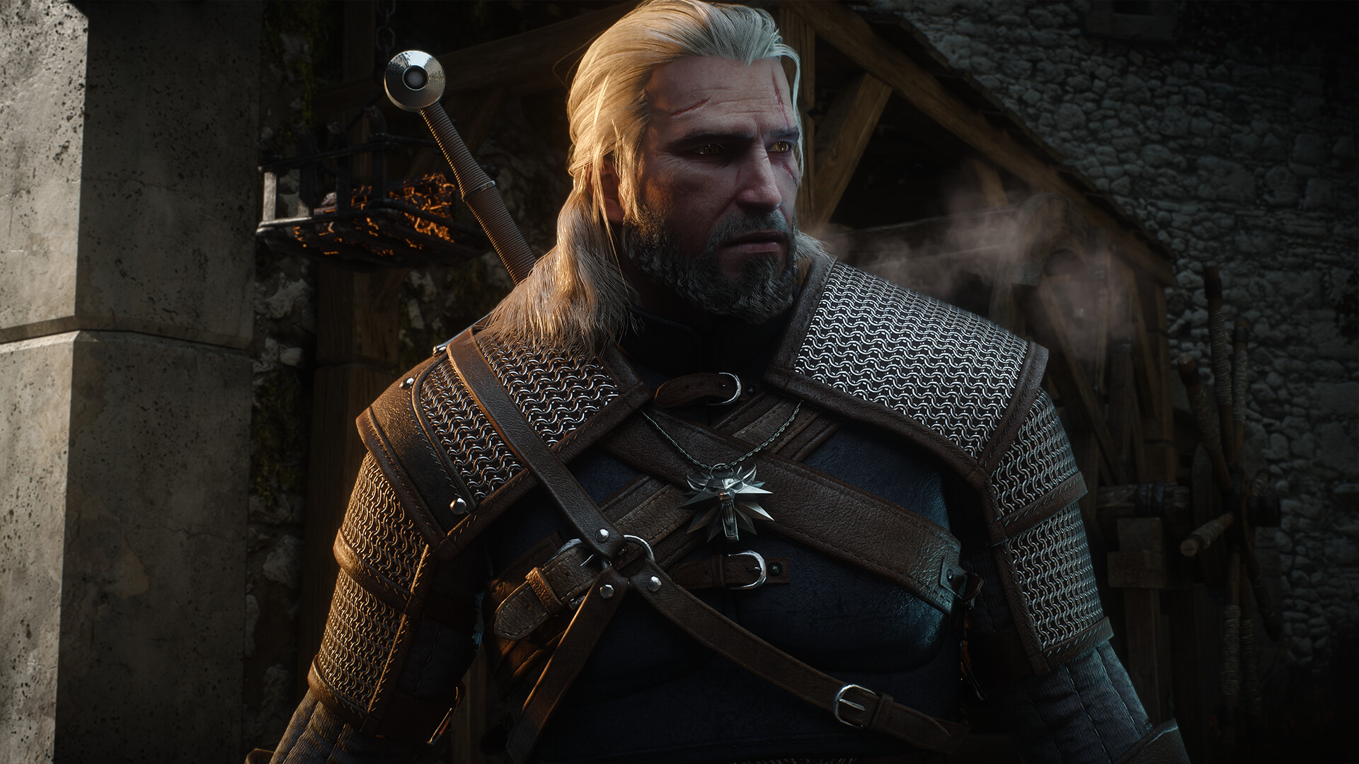Geralt em close com armadura e medalhão de lobo